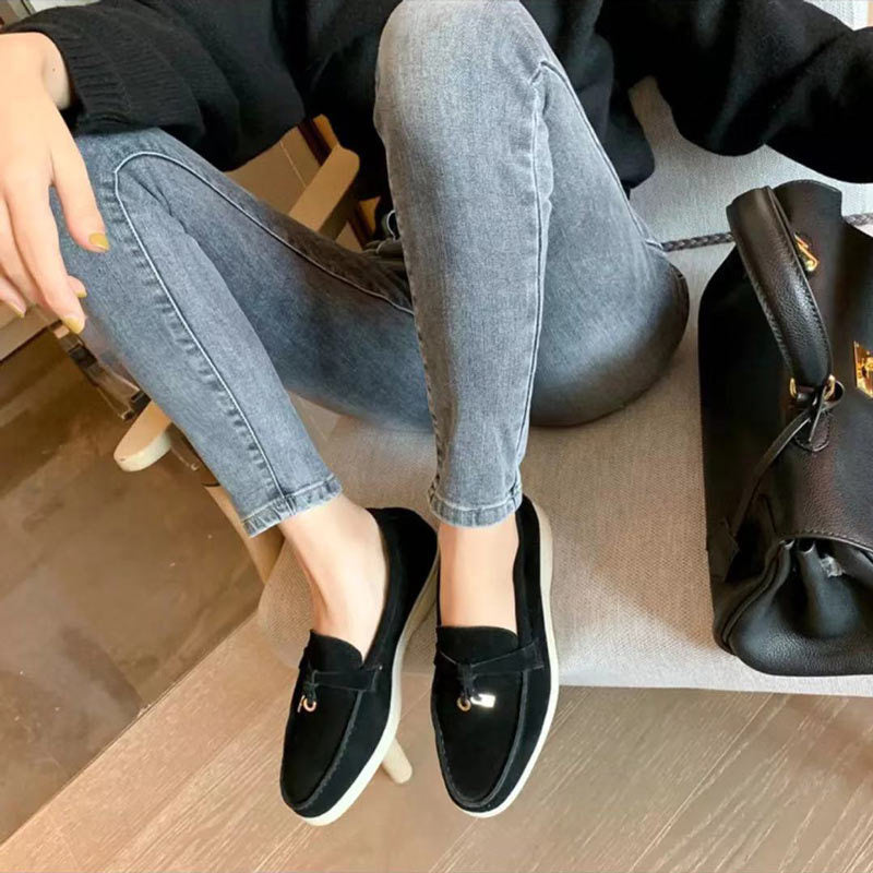 Chic women's leather moccasins with buckle detail