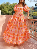 Maxikleid mit Puffärmeln, Blumenmuster und gesmoktem Rücken und Taschen