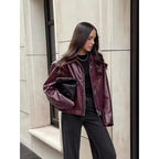 Chaqueta motera vintage de piel roja para mujer