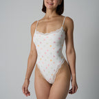 Spitzenbesetzter formender Bodysuit