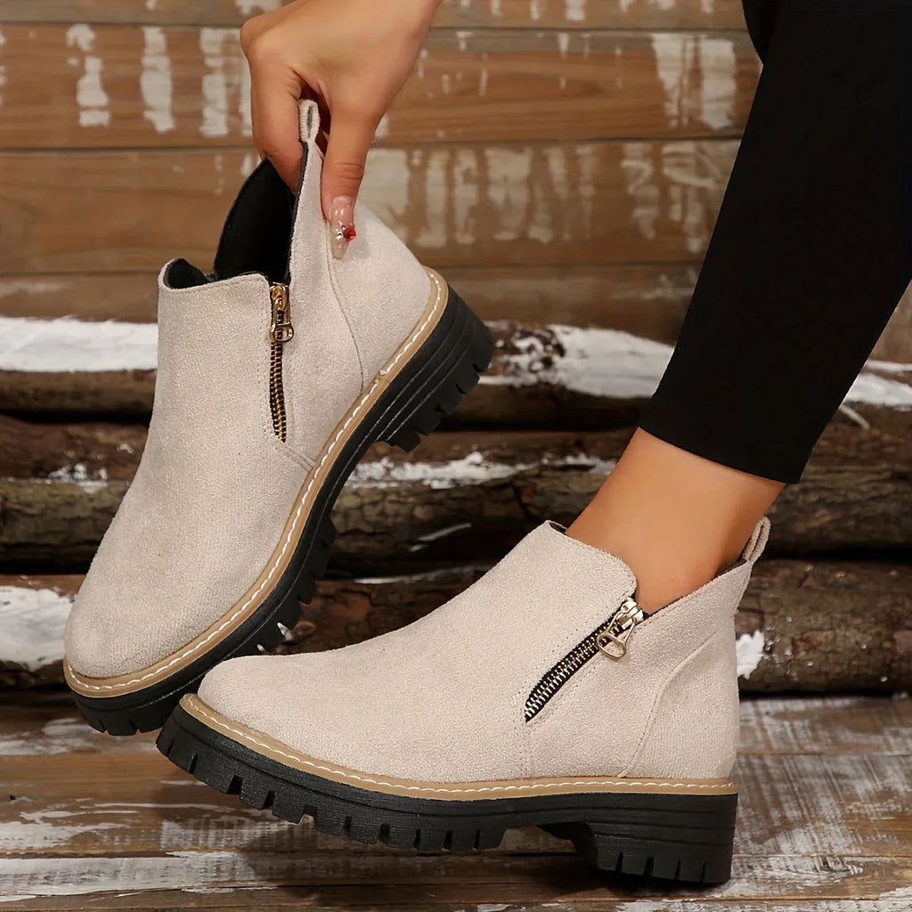 Damen-Ankle-Boots aus Leoparden-Veloursleder mit seitlichem Reißverschluss und grober Profilsohle