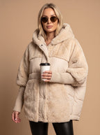Oversized-Steppjacke für Damen mit Kunstfellbesatz und Kapuze